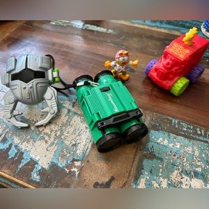 Random assortment of happy meal toys and binoculars